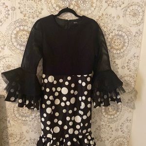 Black polka dot dress.